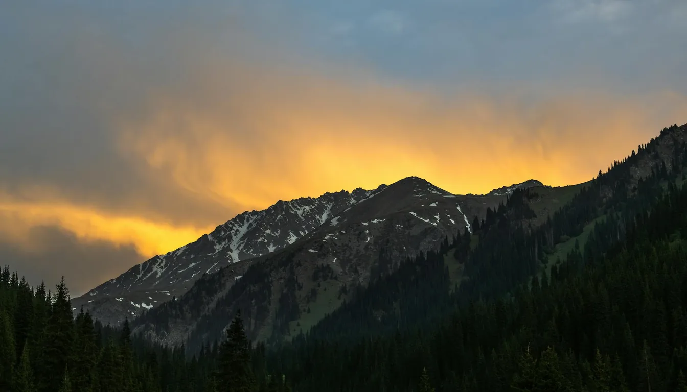 Almaty city skyline with the snow-capped Zailiysky Alatau mountains in the background