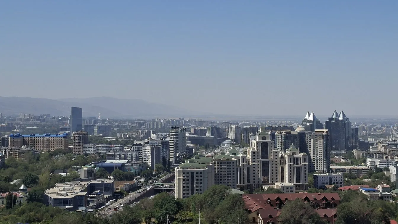 Panoramic view of Almaty city with Tian Shan mountains in the background